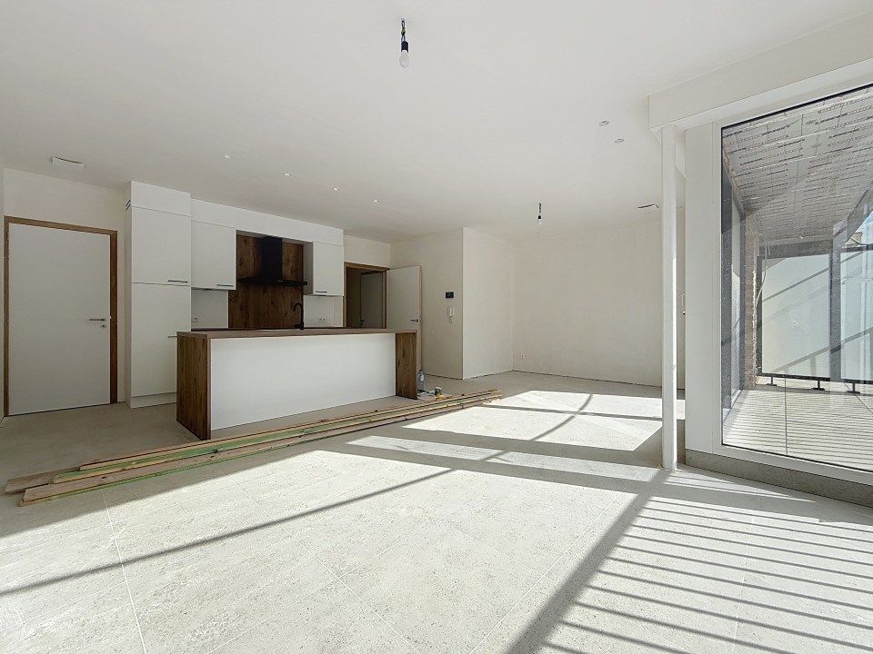 Energiezuinig nieuwbouwappartement met terras en 2 slaapkamers foto {{pictureIndex}}