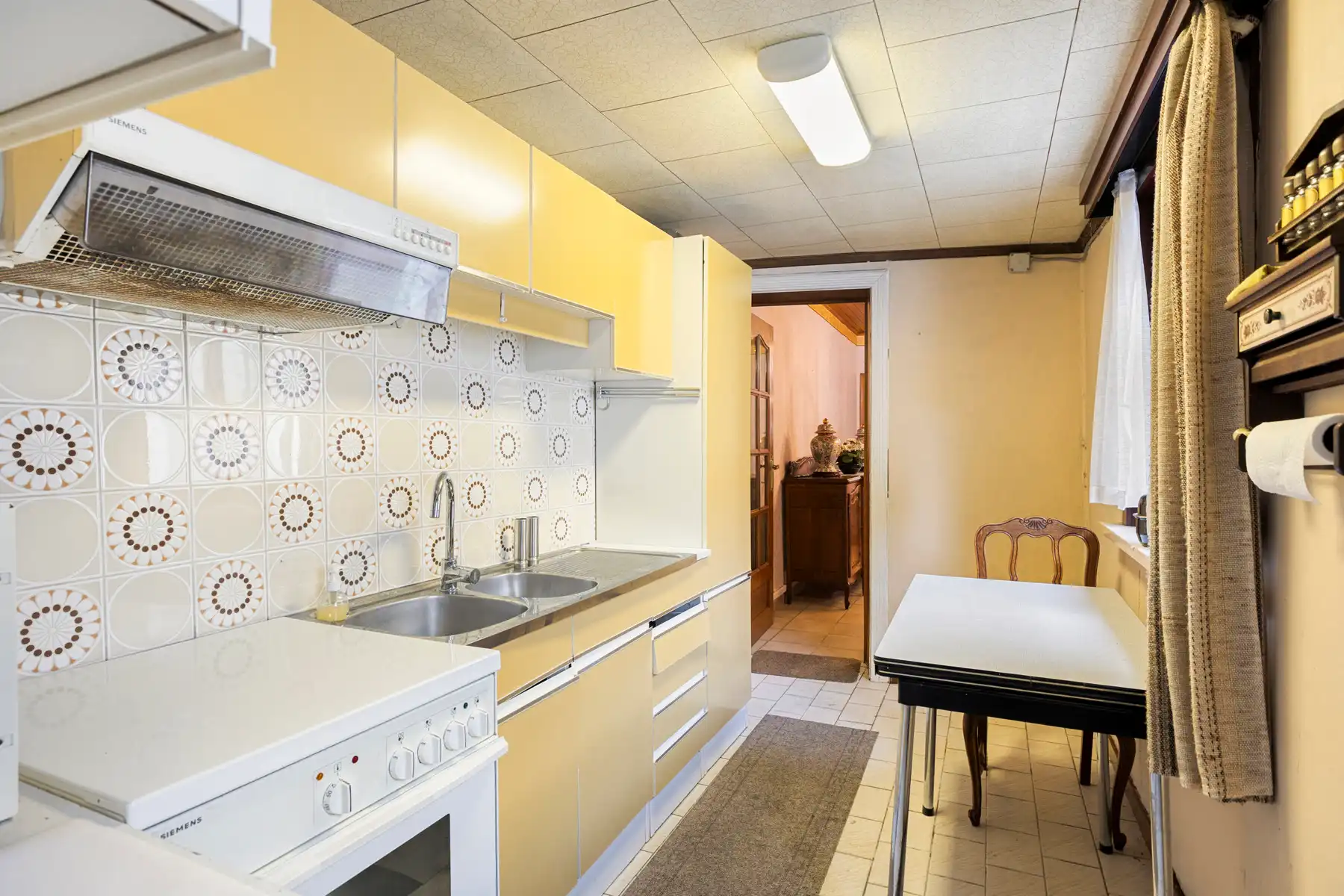 Te renoveren rijwoning met ruim perceel van 445 m²  foto 8