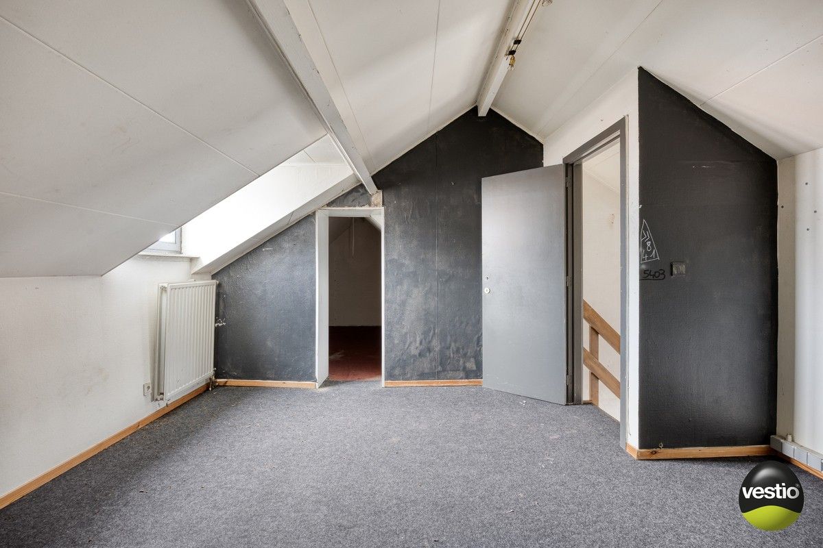 Handelspand met woonst / projectopportuniteit aan de Luikersteenweg. foto 16