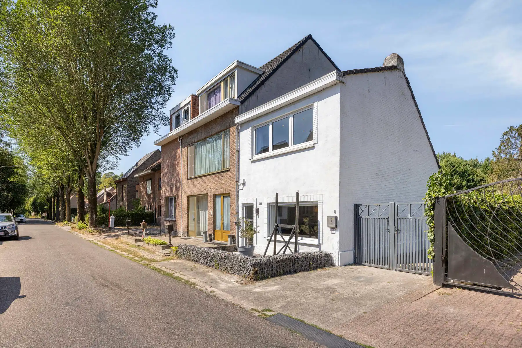 Hoofdfoto van de publicatie: Veelzijdige halfopen bebouwing met woonstudio in de tuin