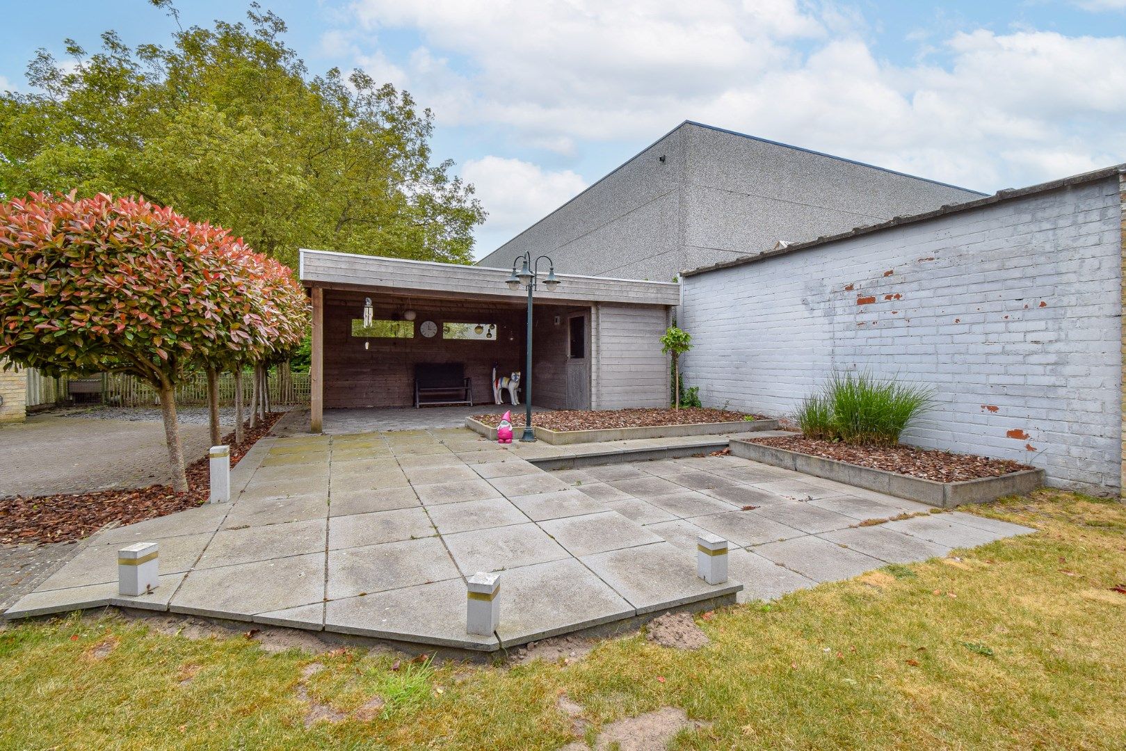 Verzorgde woning met 4 slaapkamers, garage en mooie tuin foto 9