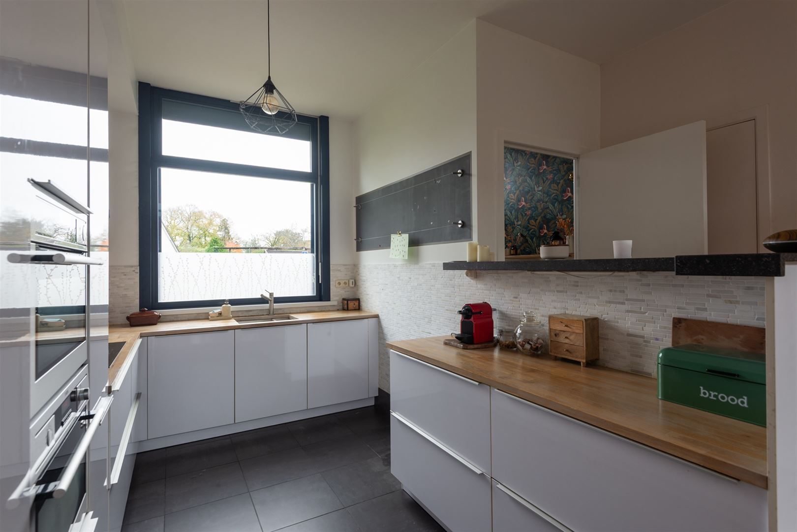 Charmante woning met zonnige tuin in hartje Kontich foto 7