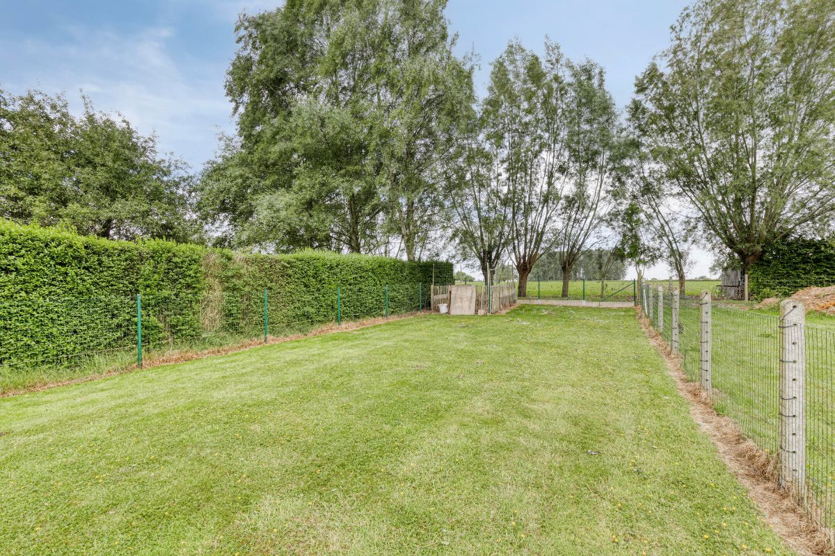 Instapklare gezinswoning met prachtige tuin en garage foto 7