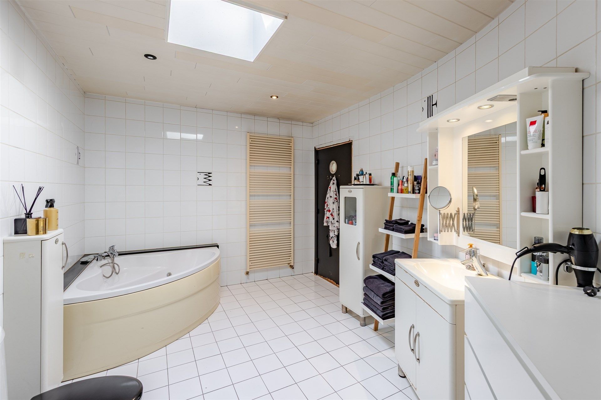 Bijzonder ruime woning met diepe tuin in Wetteren centrum foto 12