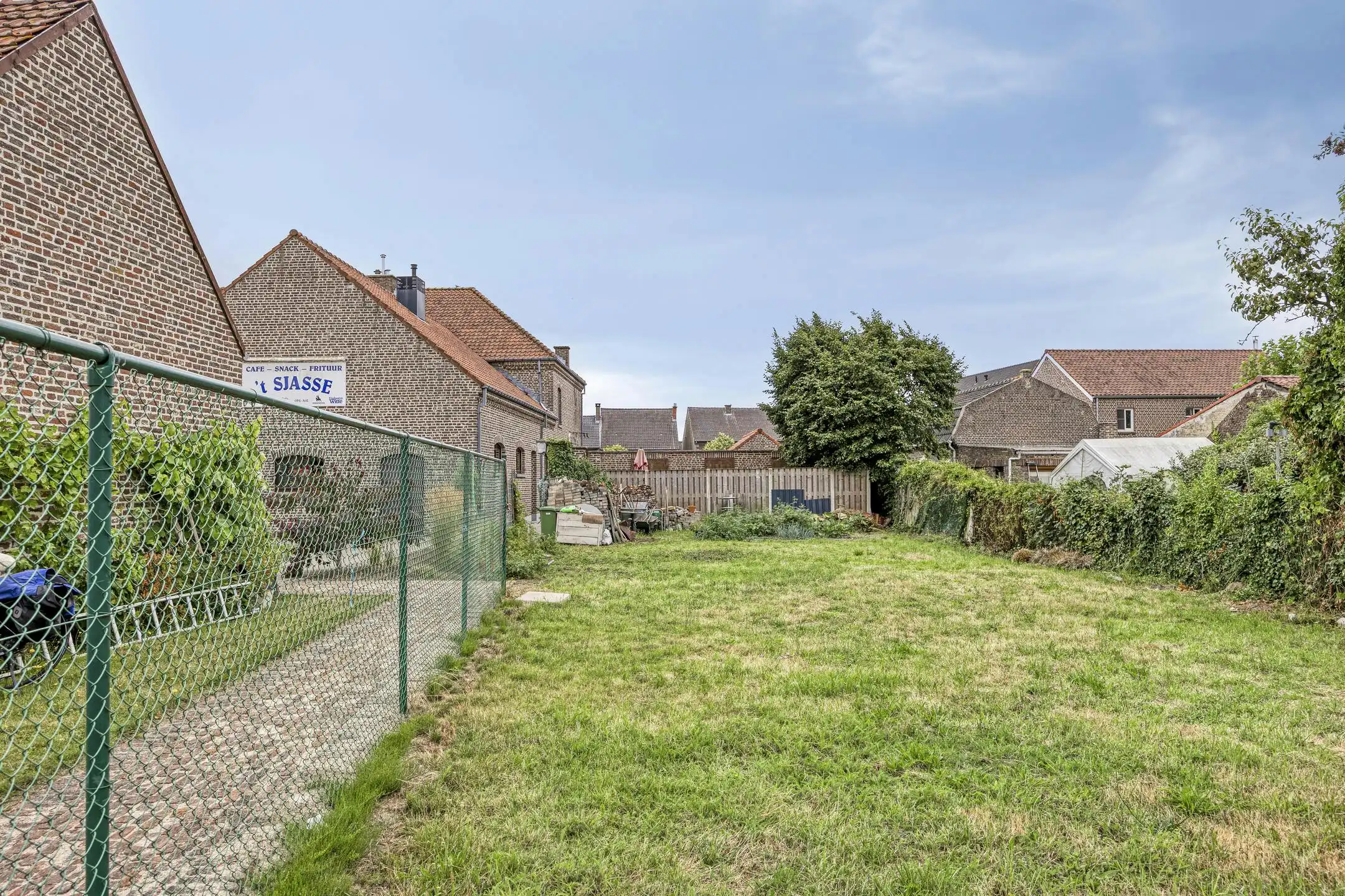 Handelshuis met café en feestzaal + bouwgrond te koop in Tongerlo  foto 34