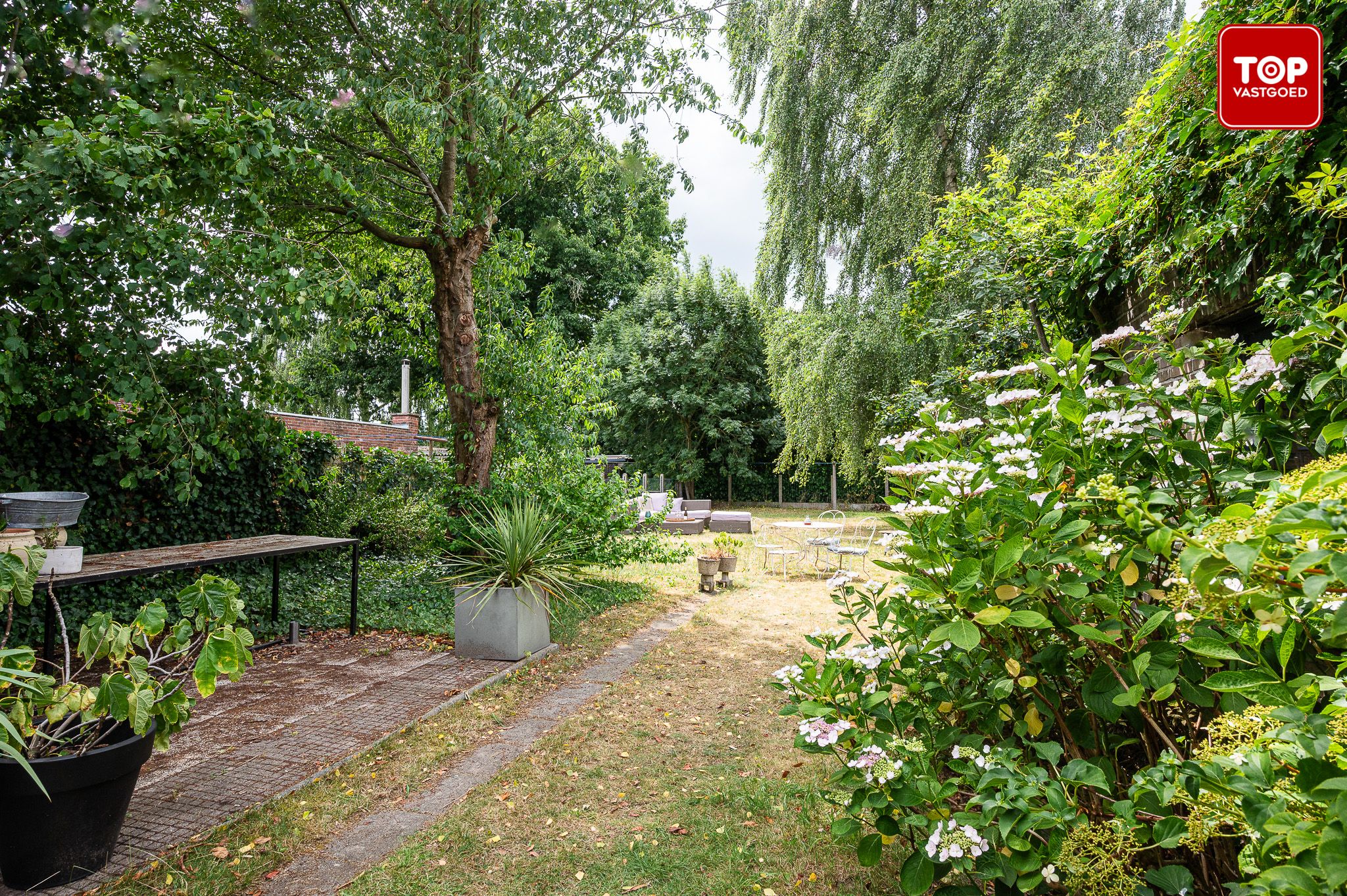 Lichtrijke gezinswoning met prachtige tuin in Merelbeke foto 23