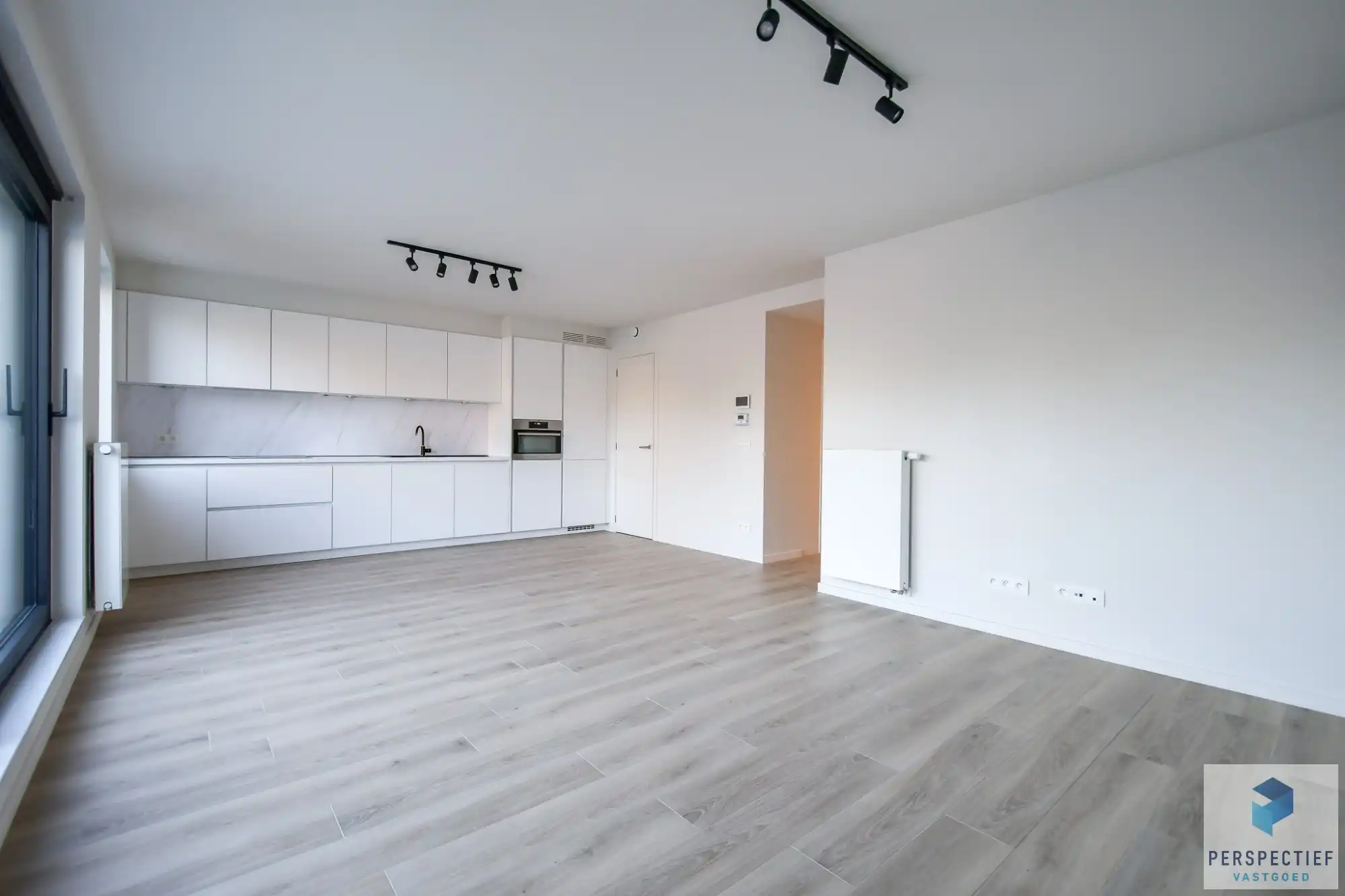 BEZOEKMOMENT WOENSDAG 10/06 VAN 16U30 TOT 18U | RECENT ENERGIEZUINIG APPARTEMENT met TERRAS & AUTOSTAANPLAATS foto 8