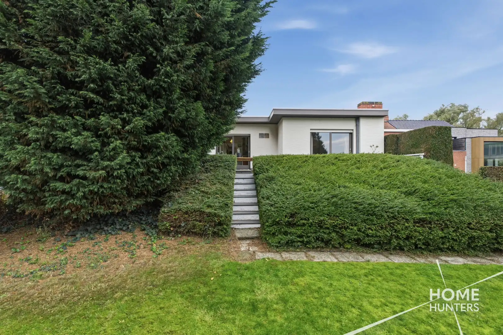 RUSTIG GELEGEN BUNGALOW MET RUIME TUIN EN VEELZIJDIGE KELDERRUIMTE foto 37