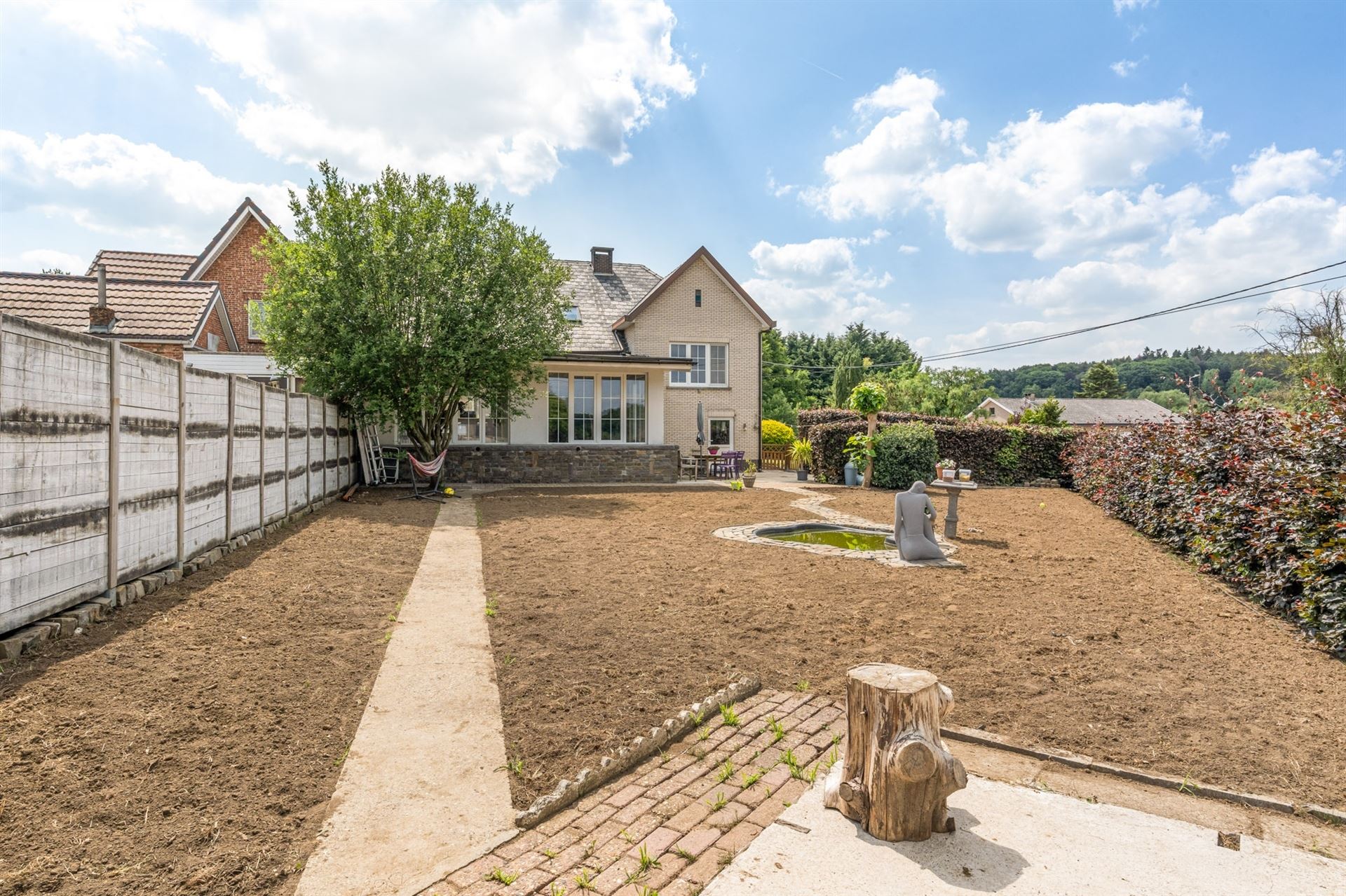 Eengezinswoning in halfopen bebouwing met tuin. foto 30