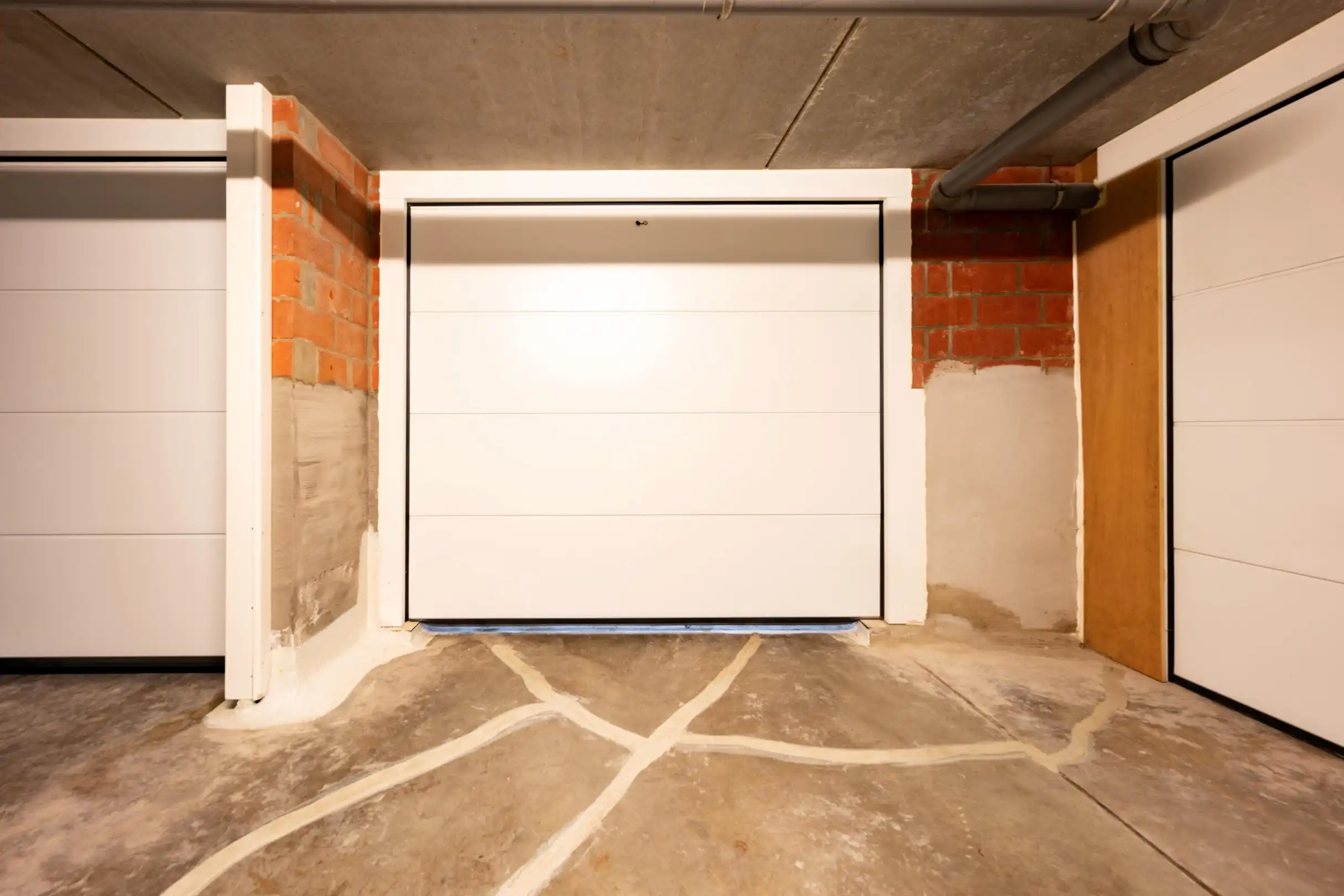 Gesloten garagebox in het centrum van Heist foto 3