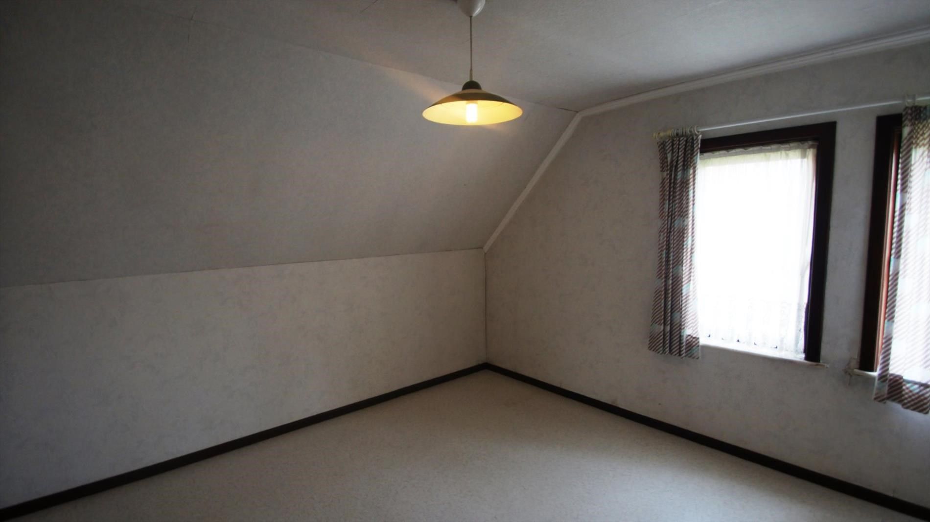 Ruime woning met 2 slpks en mooie tuin foto 7