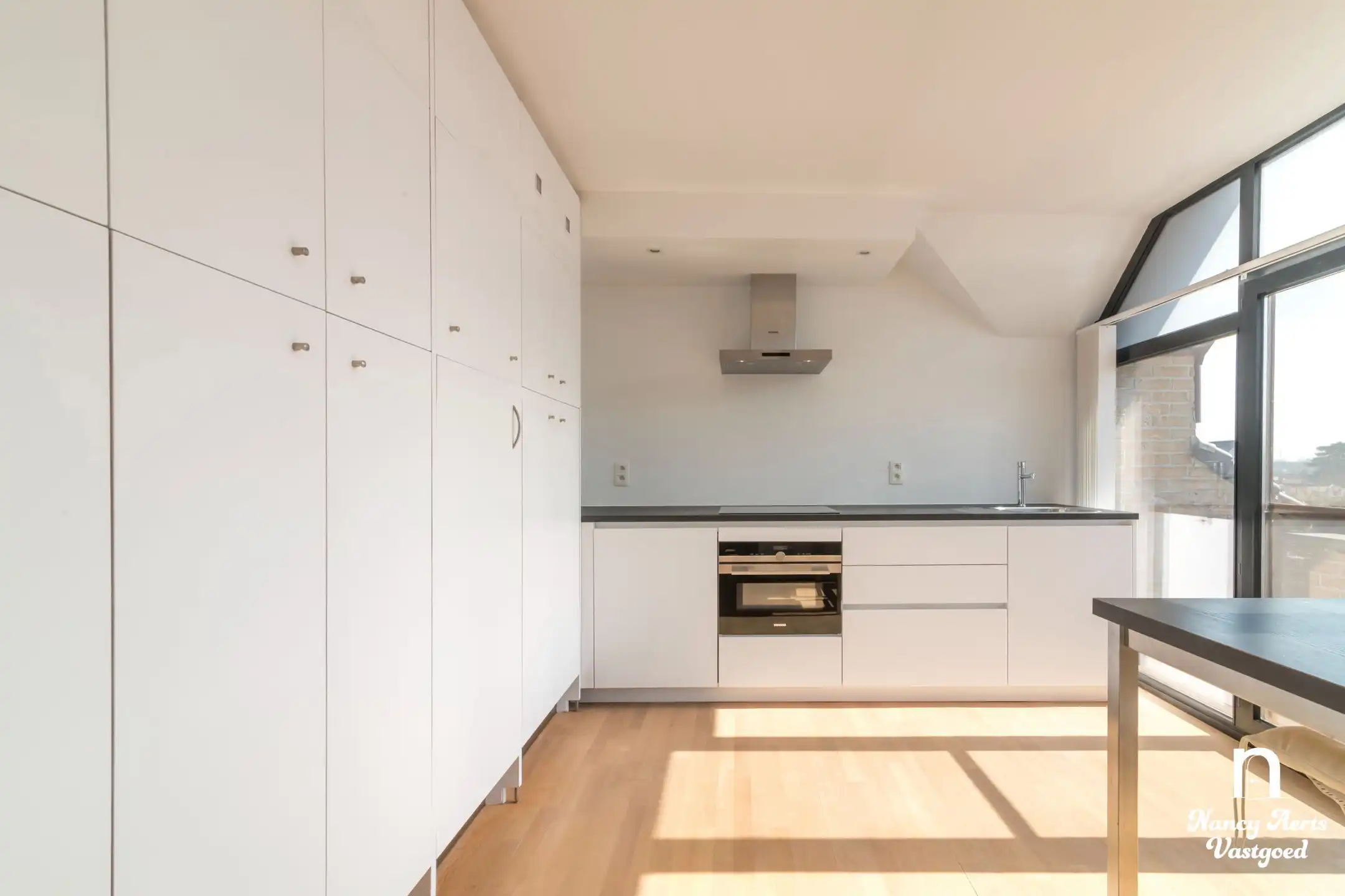 Ruim, lichtrijk appartement met zonnig terras in hartje Paal foto 9