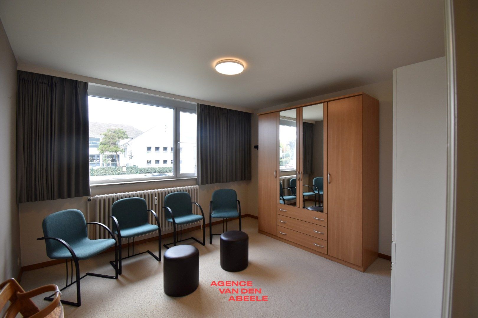 Stijlvol gelijkvloers appartement met royaal terras en boszicht foto 15