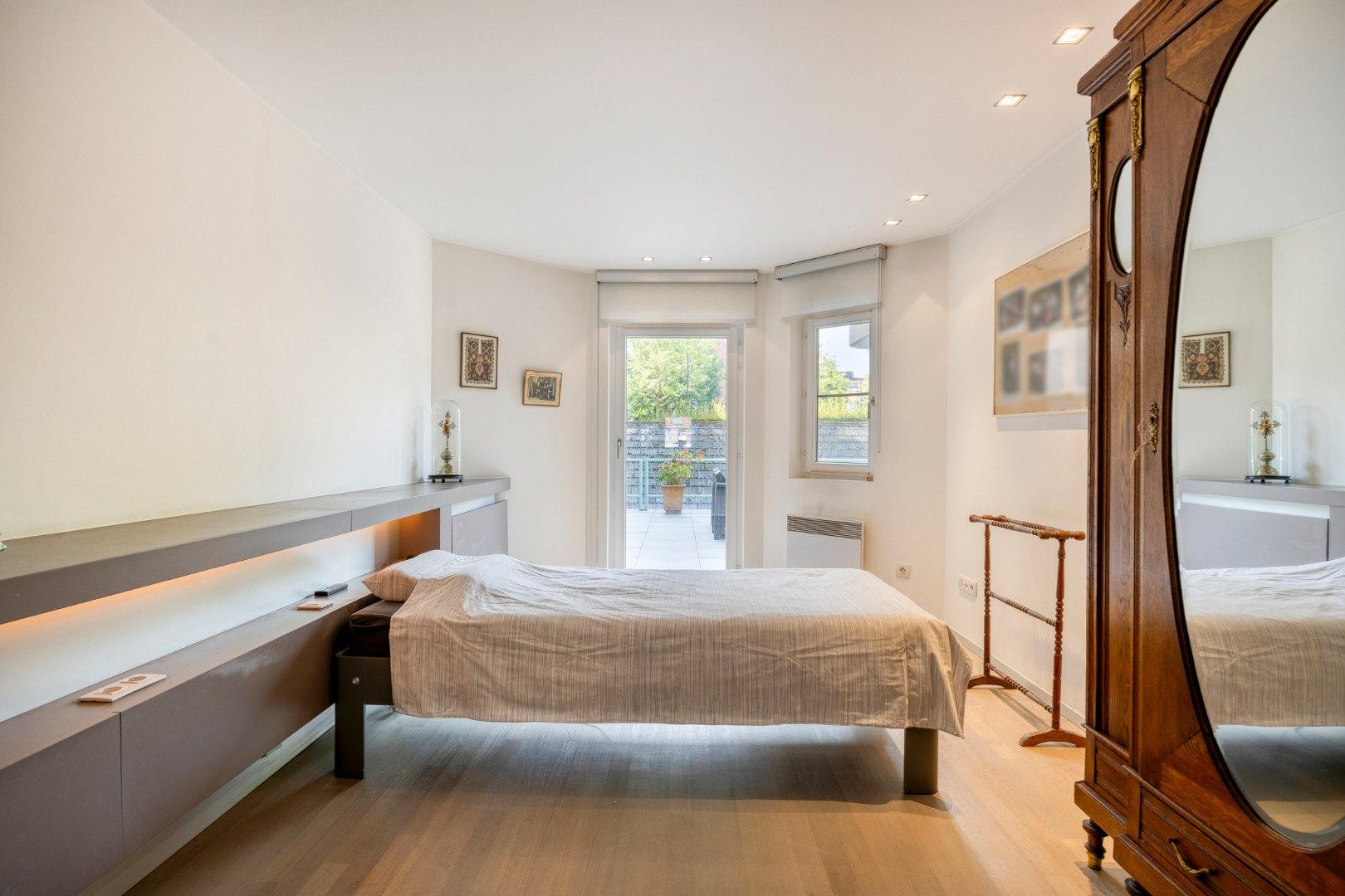 Gelijkvloers appartement met een terras van 50m²,  3 slaapkamers en 2 staanplaatsen in het centrum van Leuven! - bewoonbare opp. 147m²  foto 16