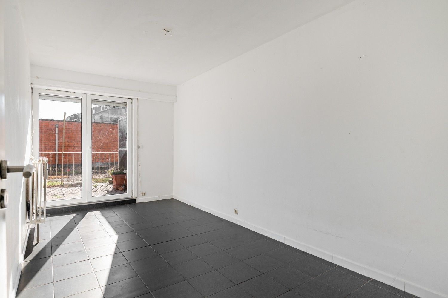 Ruim gelijkvloers appartement met 3 slaapkamers en terras in Deurne! foto 9