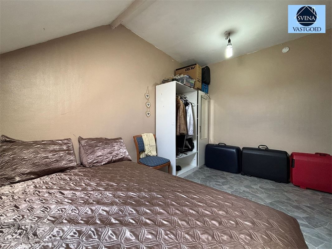 WONING MET 5 SLAAPKAMERS EN STADSTUINTJE. foto 10
