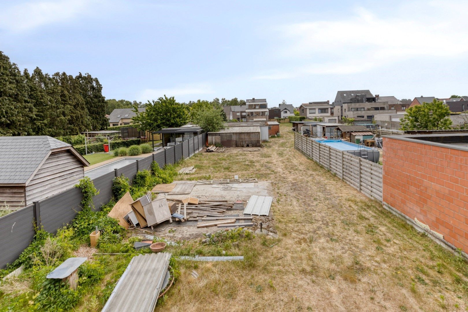Bouwgrond van 674m² met af te  breken woning in een doodlopende straat te Ginderbuiten ! foto 2