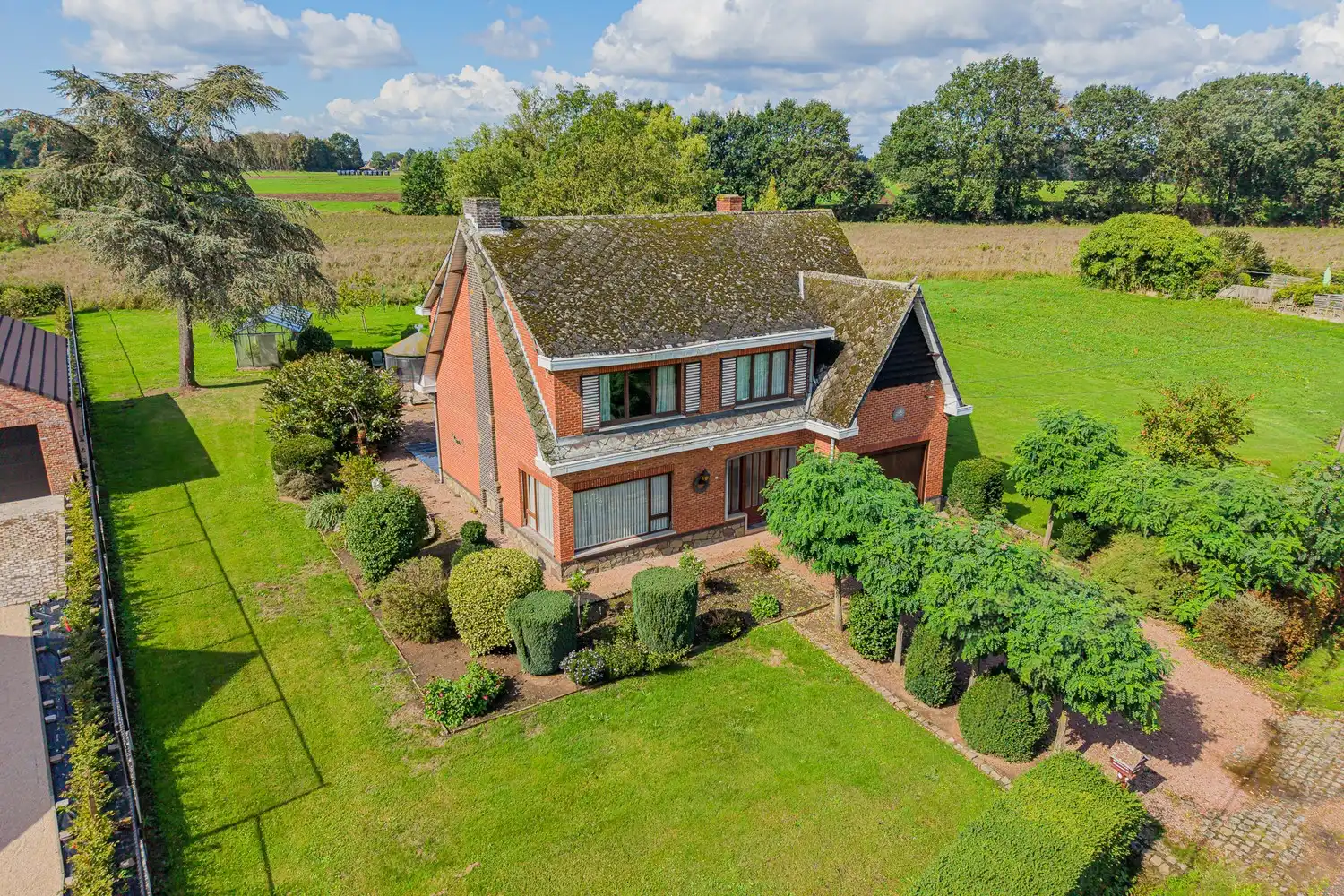 Hoofdfoto van de publicatie: Ruime gezinswoning met 4 slaapkamers op uitzonderlijk perceel van 1,32 ha in Meerhout