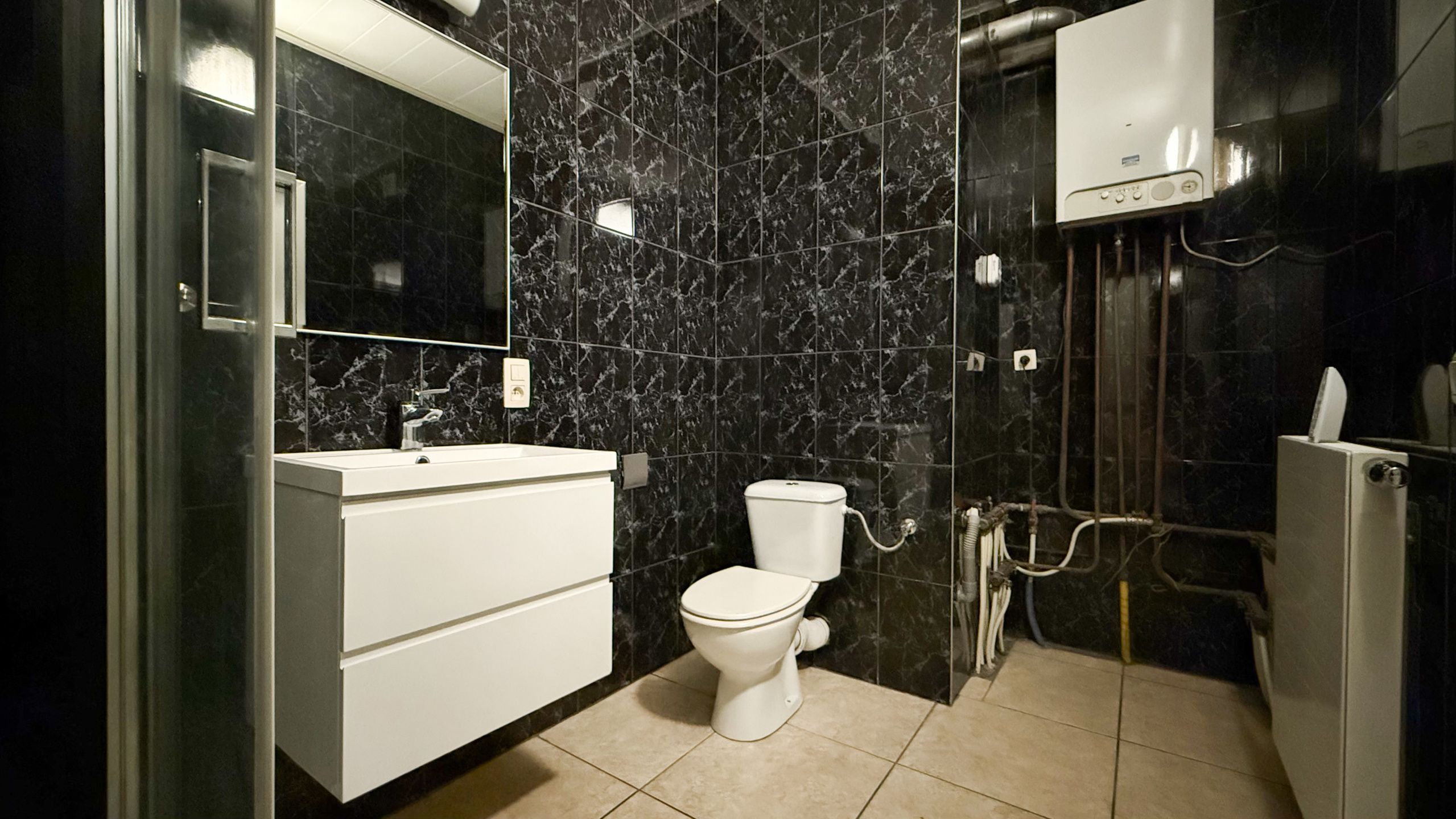Gelijkvloerse appartement met 2 slaapkamers te HZ! foto 11