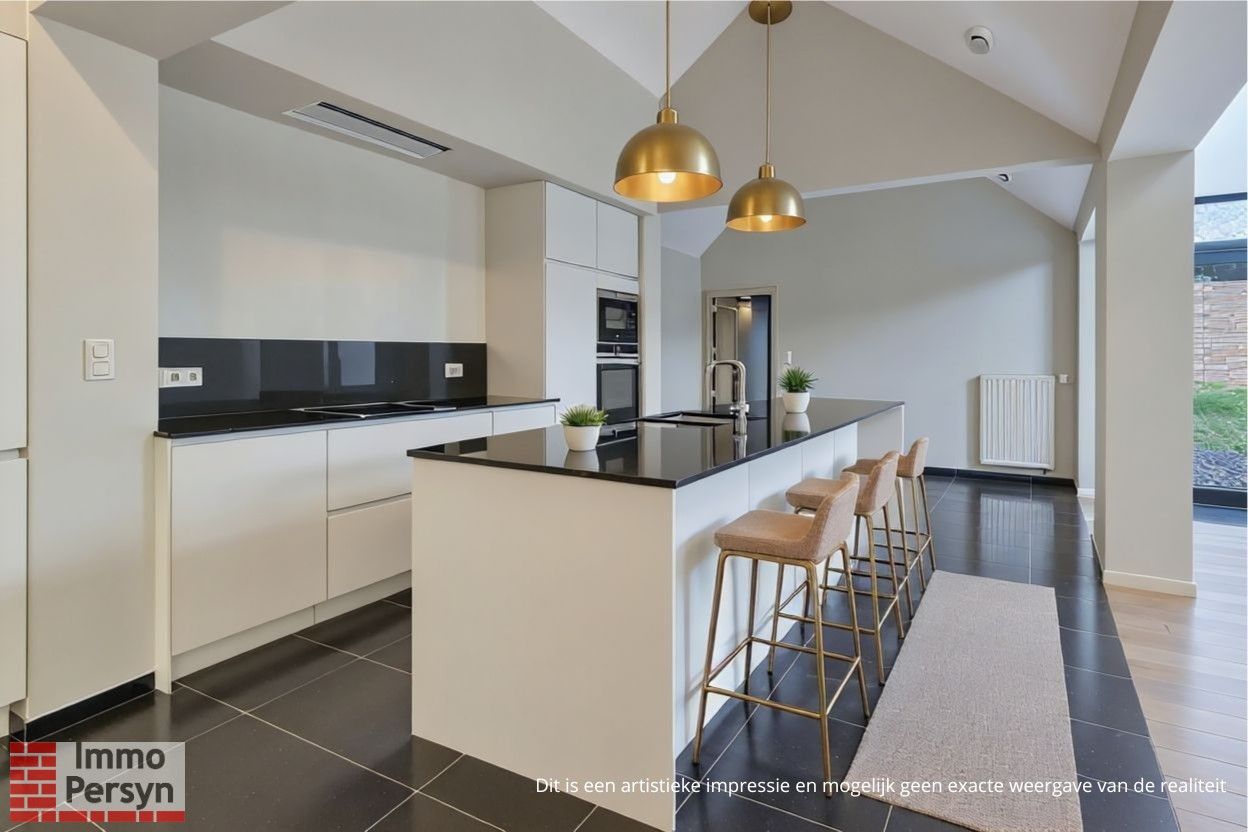 Ruim gelijkvloers appartement met tuin en 2 staanplaatsen. foto 6