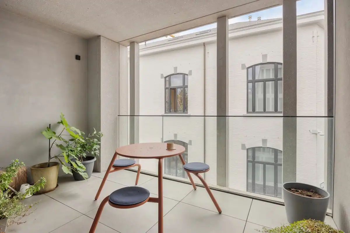 Stijlvolle cityflat met overdekt terras in hartje Hasselt – ideaal als starterswoning, pied-à-terre of investering foto 6