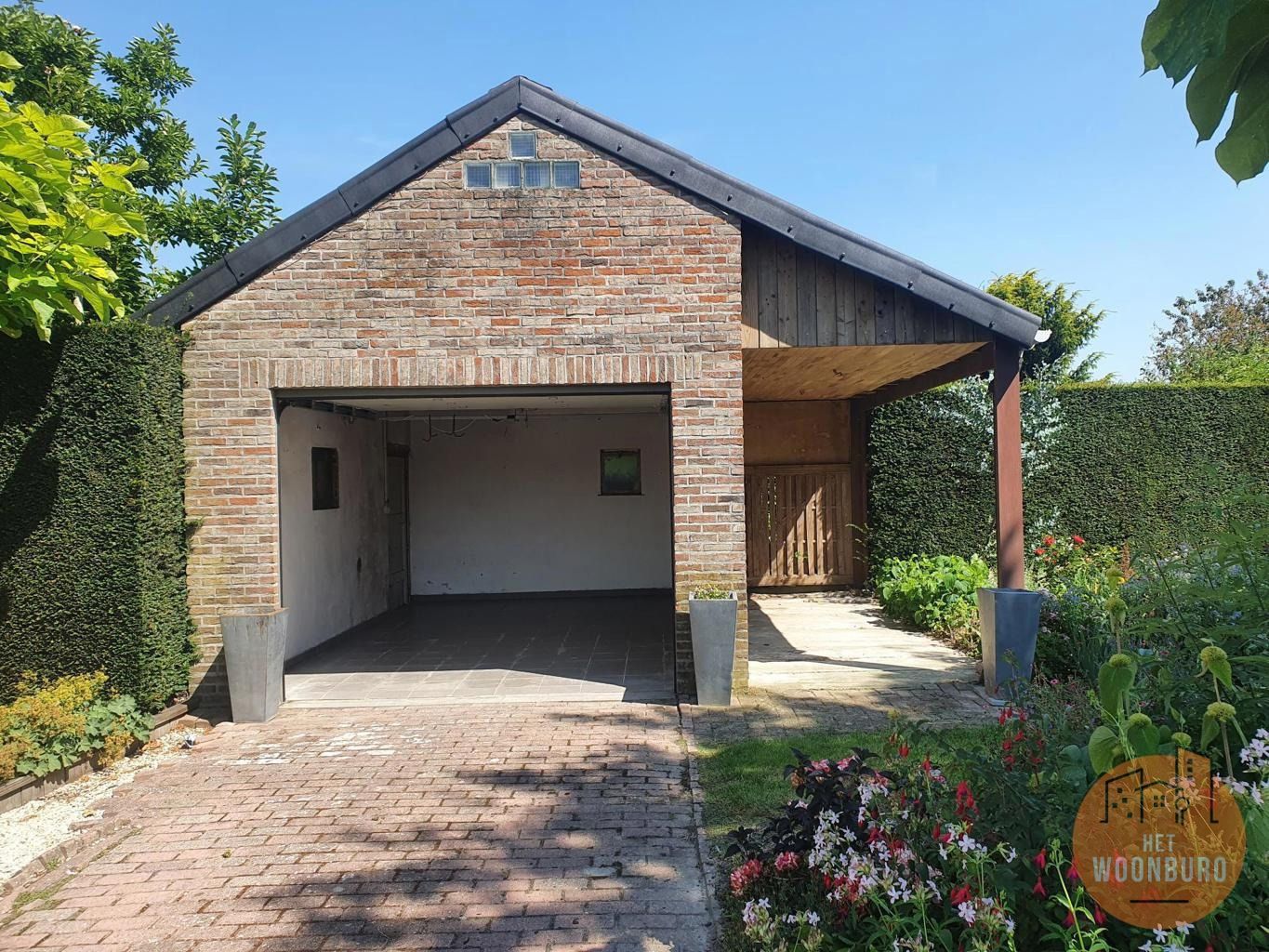 Prachtig gelijkvloersappartement met 3 slpks, garage en tuin foto 15