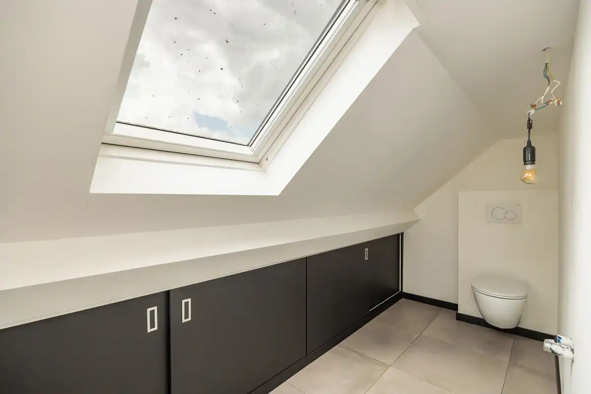 Ruim en instapklaar appartement met 3 slaapkamers, terras en autostaanplaats nabij het centrum van Wommelgem foto 19