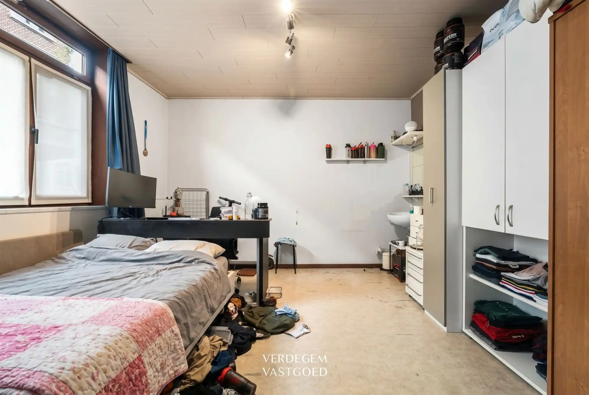 Opbrengsteigendom met 6 studentenkamers, fietsenberging en buitenruimte foto 7