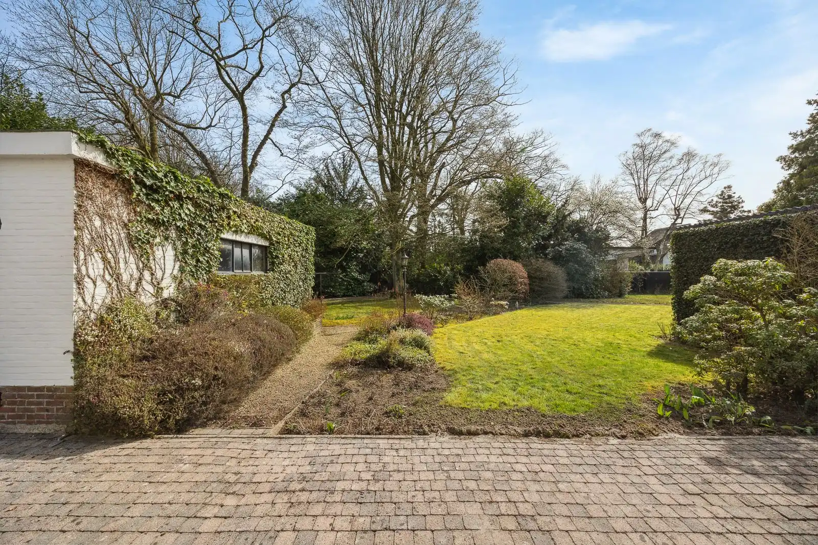 Ruime bouwgrond van ca. 1407 m² te Kapellen – rustig gelegen en omgeven door groen ! foto 2