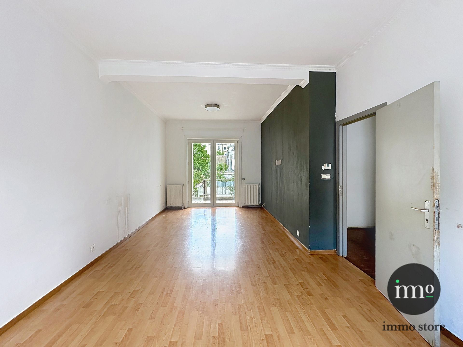 Goedgelegen rijwoning met 3, mogelijks 4 slaapkamers en tuin foto 5