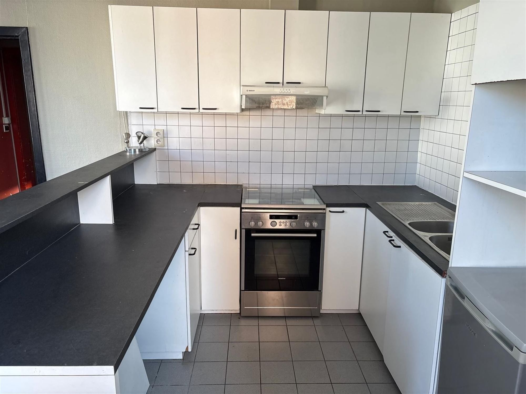 Een stadswoning met klasse én commerciële troef foto 21