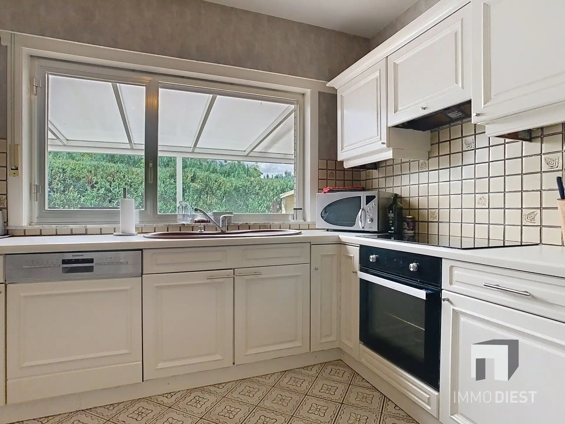Gelijkvloerse instapklare woning met grote tuin op ca. 39a foto 17