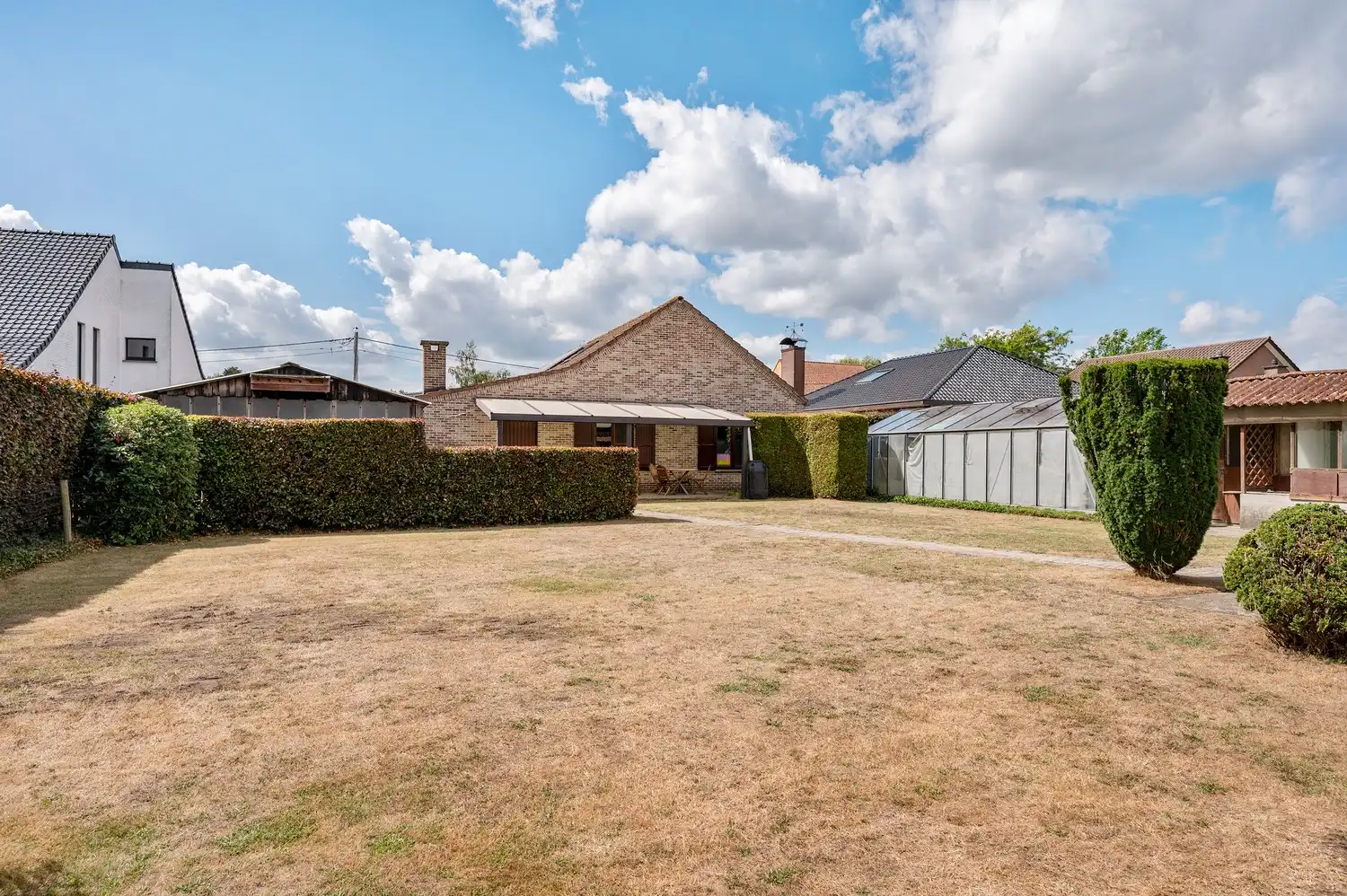 Instapklare open bebouwing op een ruim perceel van 1.185 m², landelijk gelegen met een prachtig vrij uitzicht aan de achterzijde. foto 38