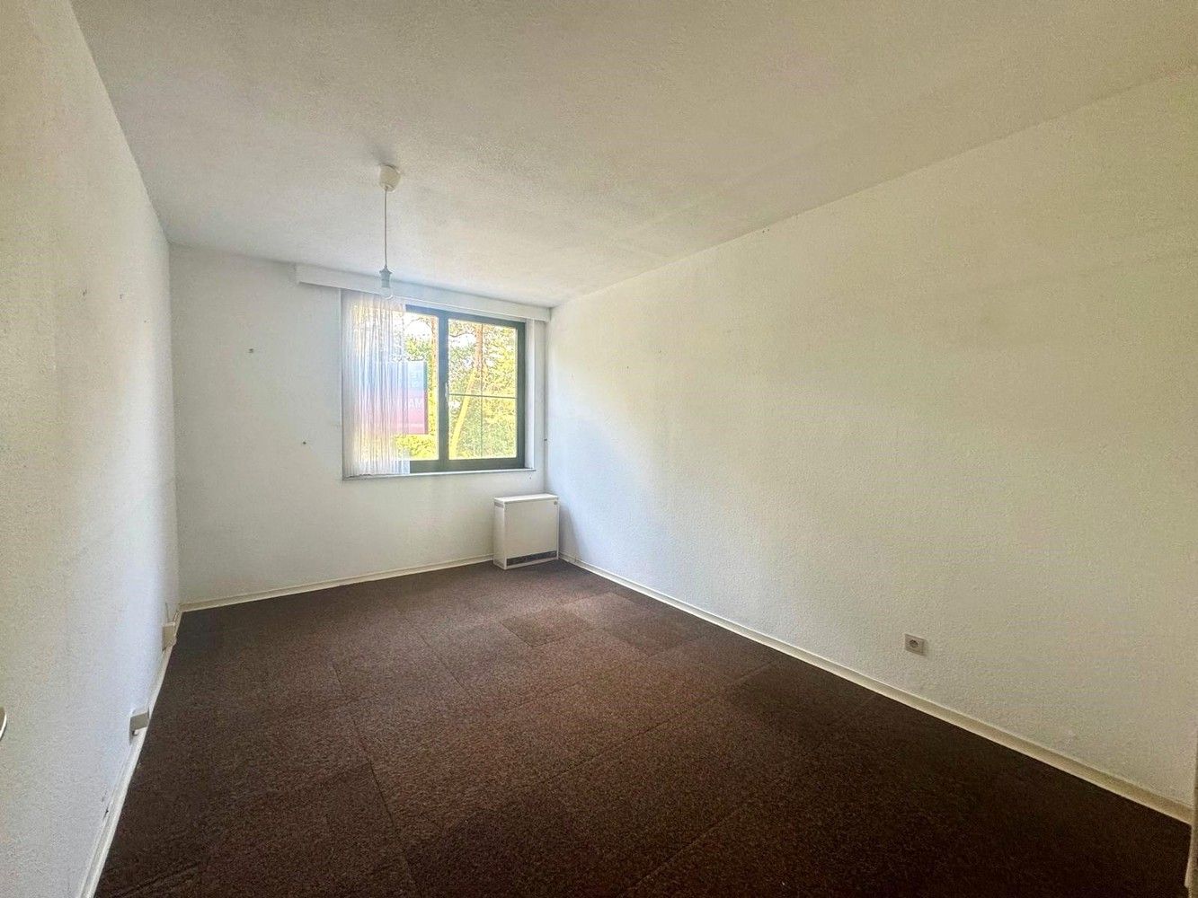 Rustig gelegen en ruim appartement met zonnig terras en garage foto 6