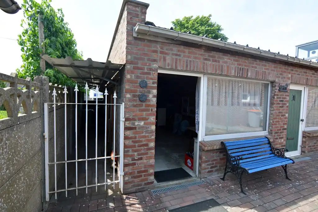 Gelijkvloers appartement met 3 slpks, veranda, tuin en garage foto 21