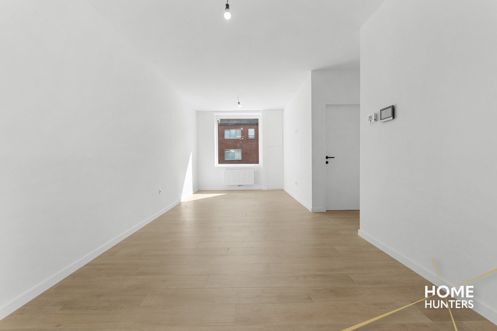 Volledig gerenoveerde woning (anno 2025) met 3 ruime slaapkamers, ruime garage + tuin te Ieper foto 4
