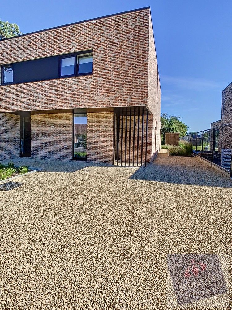 Recent en energiezuinige halfopen woning op toplocatie in Zonhoven foto 3