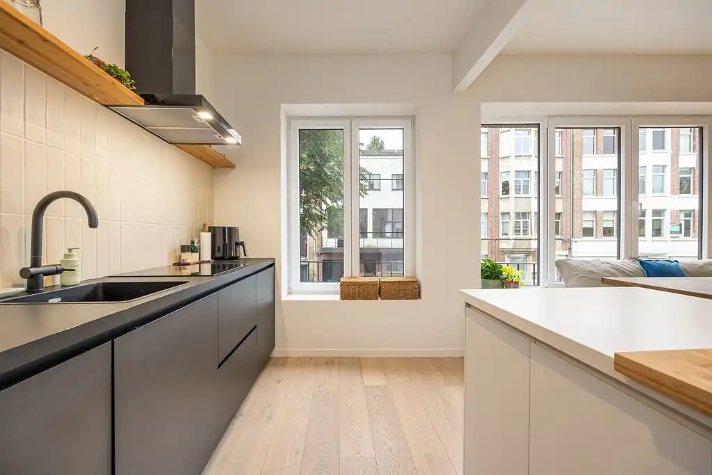 Instapklaar appartement met ruime tuin foto 6