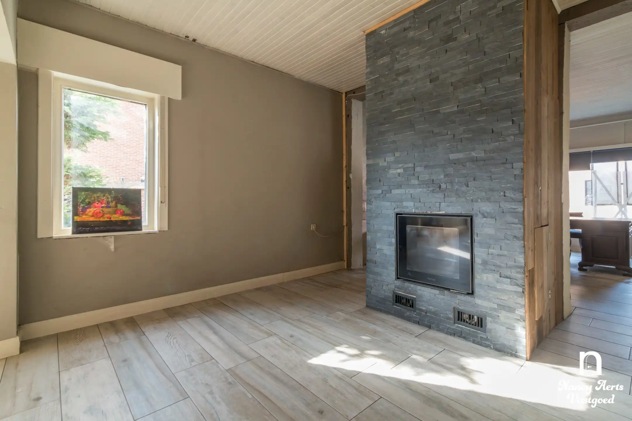 Ruime halfopen woning met tuin en veel potentieel foto 29