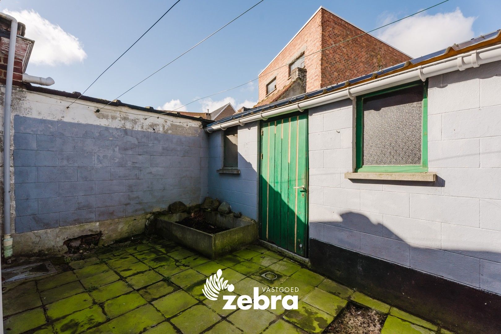 Te renoveren woning op een steenworp van de markt in Tielt! foto 13