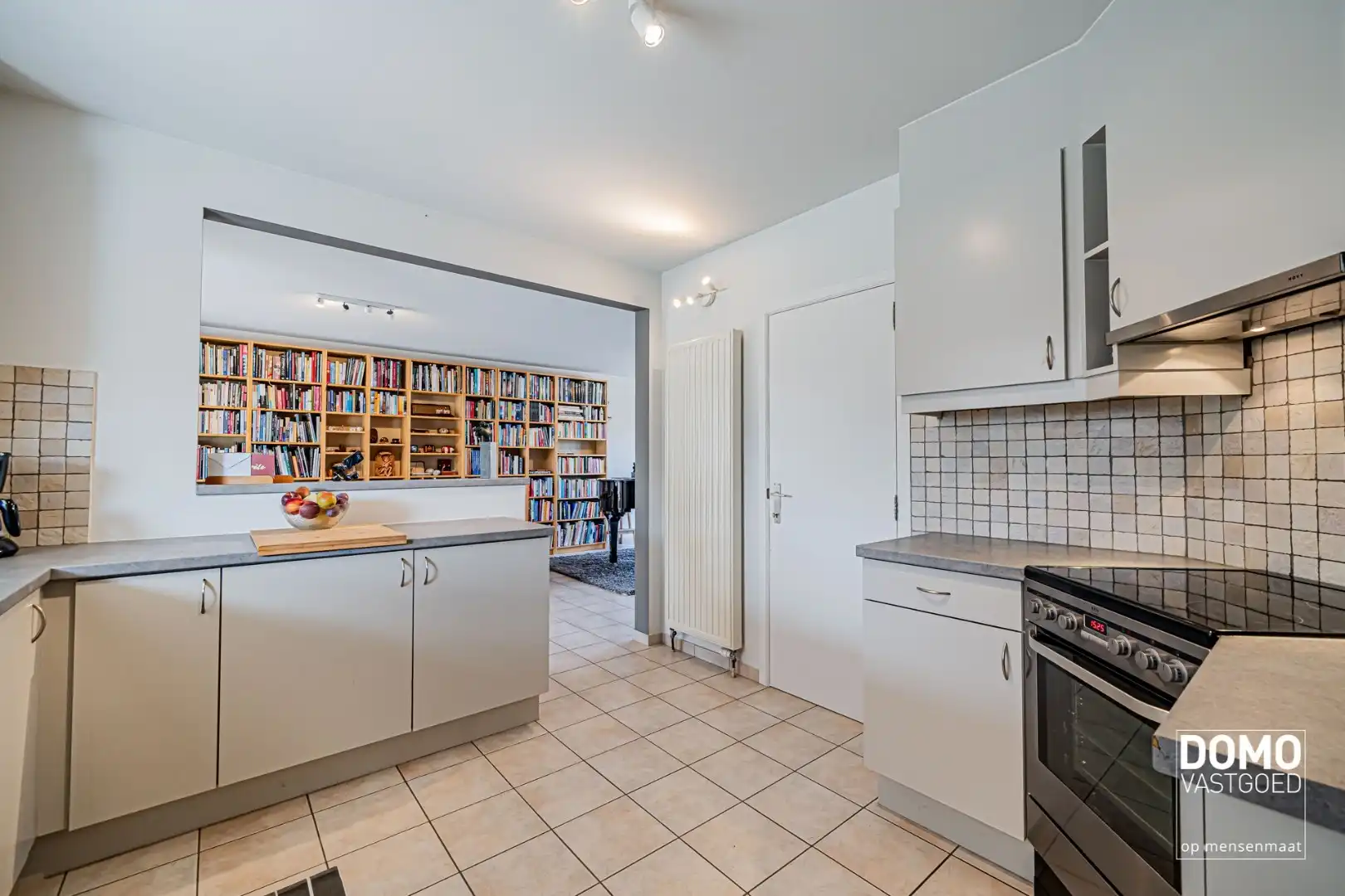 ZUIDWESTELIJK GEORIËNTEERDE DOORZONWONING MET LICHTRIJKE AANBOUW, GEZELLIGE TUIN EN RUIME GARAGE TE KURINGEN (HASSELT)  foto 10