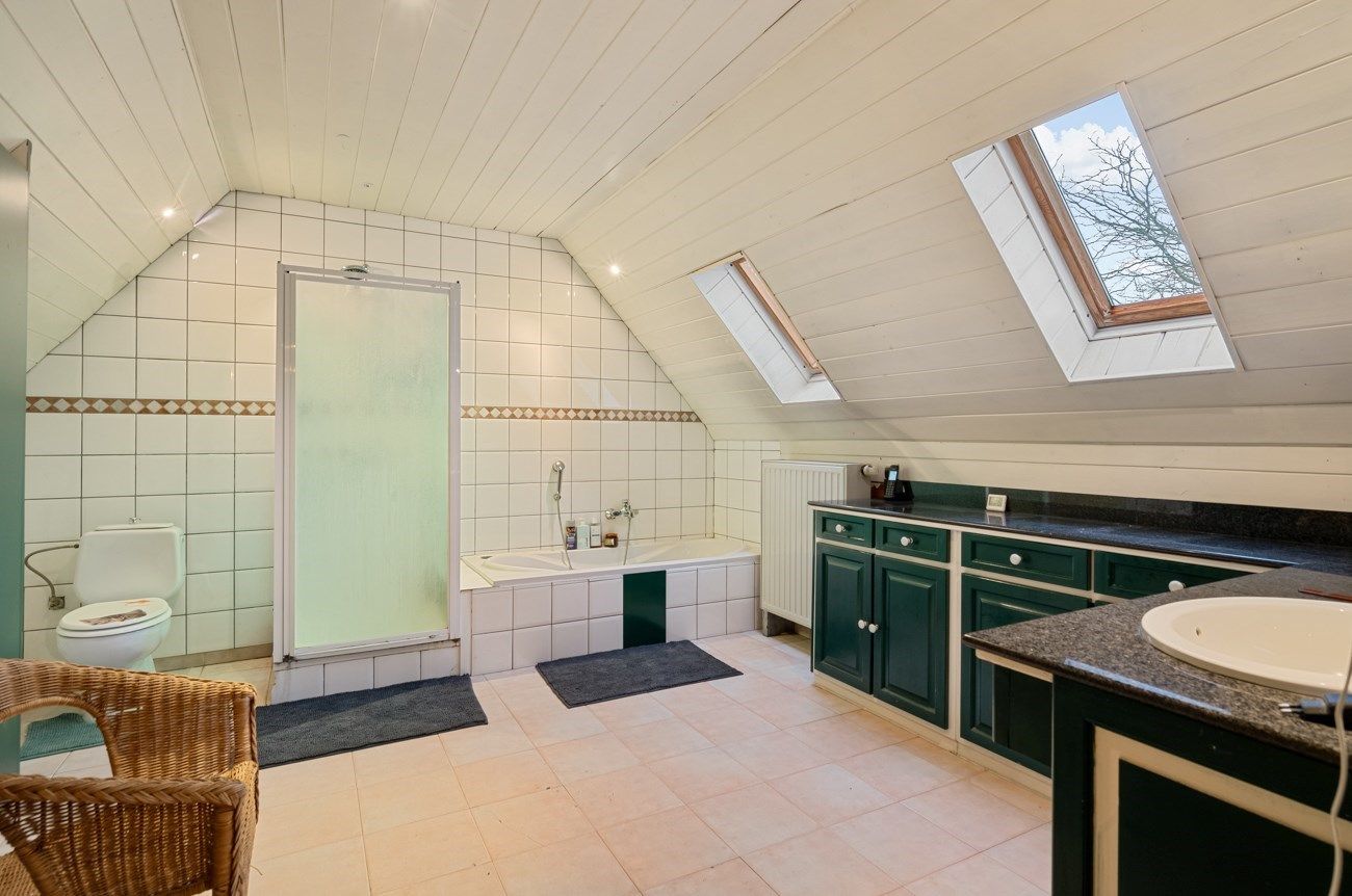 Goed gelegen villa in hoeve-stijl met ruime tuin foto 16