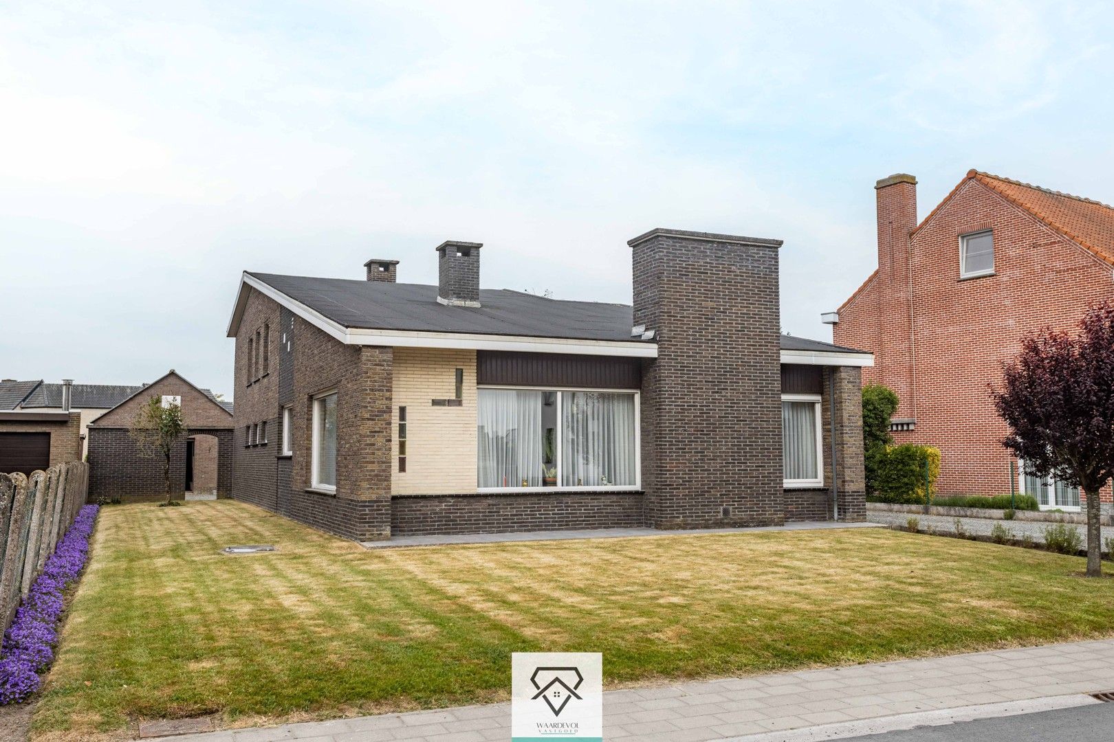 Hoofdfoto van de publicatie: Vrijstaande woning op perceel van 1021 m² met loods en ruime tuin