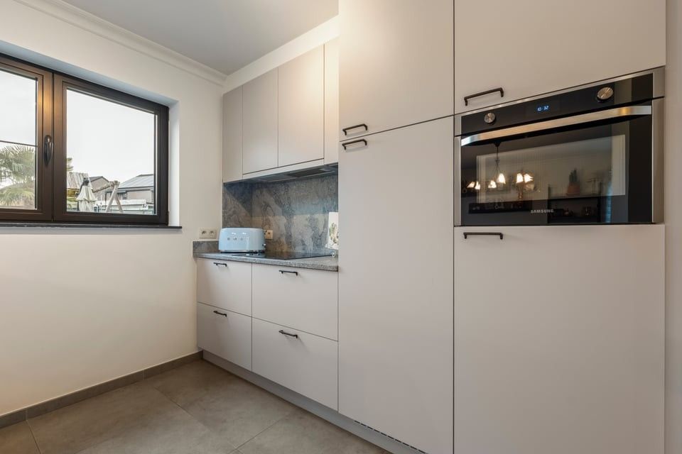 GEZELLIGE INSTAPKLARE GEZINSWONING MET 3 SLAAPKAMERS EN GARAGE IN KOZEN foto 13