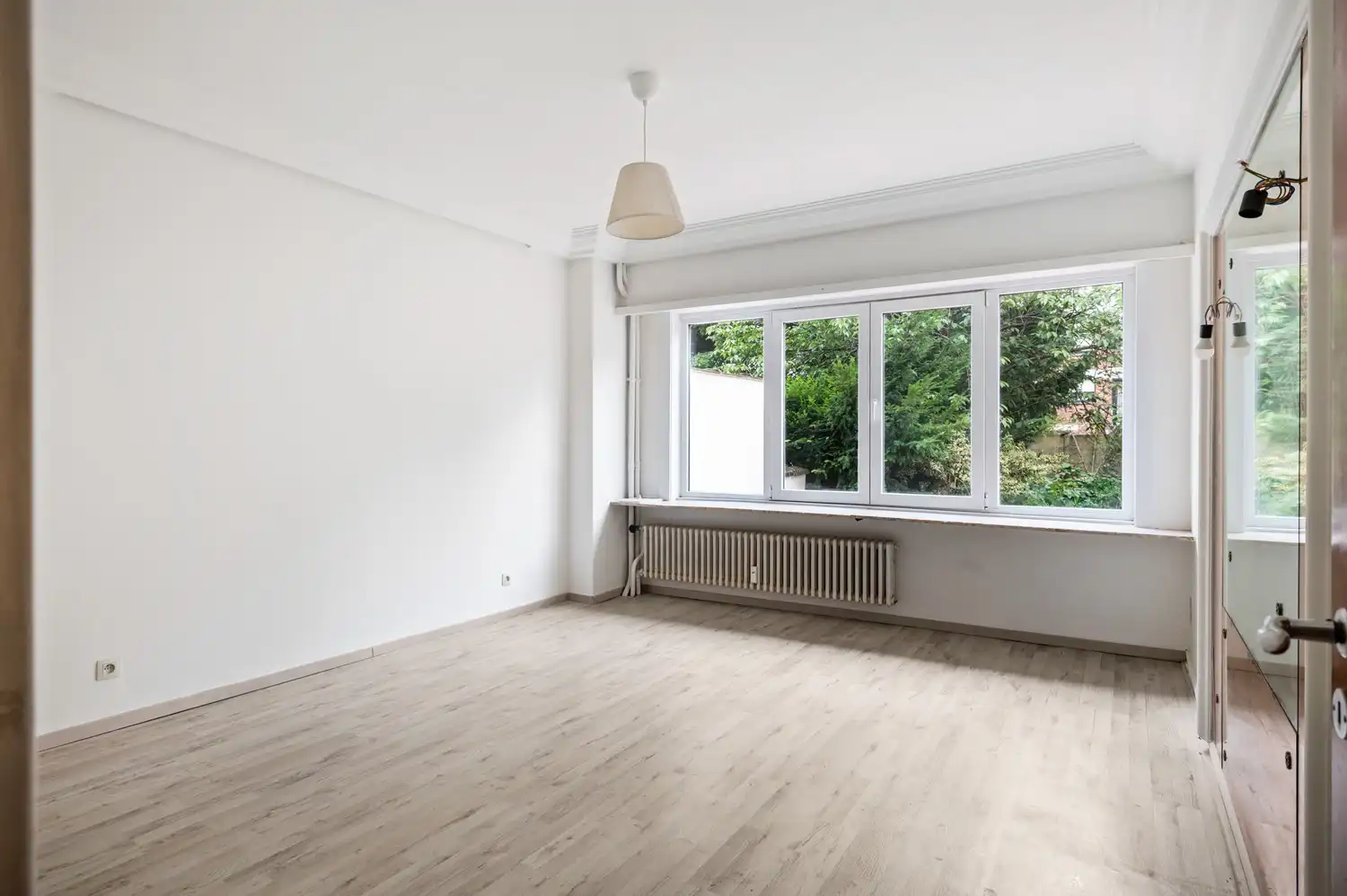 Ruim gelijkvloers appartement met 3 slaapkamers, tuin en garage! foto 10