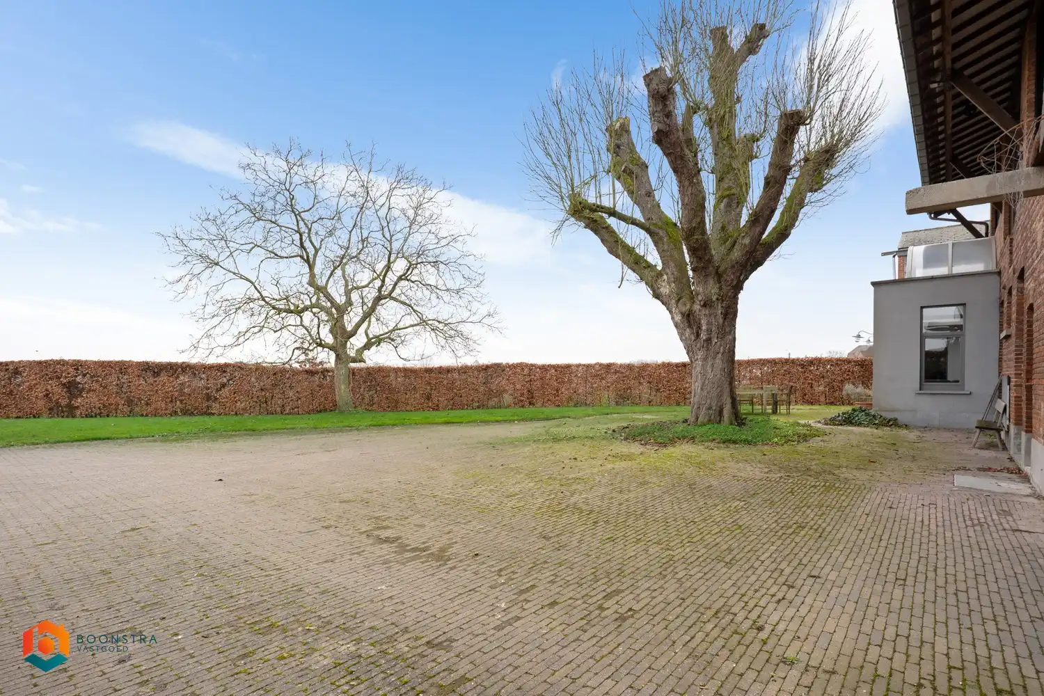 Zonevreemde woning met magazijn te Putte foto 28