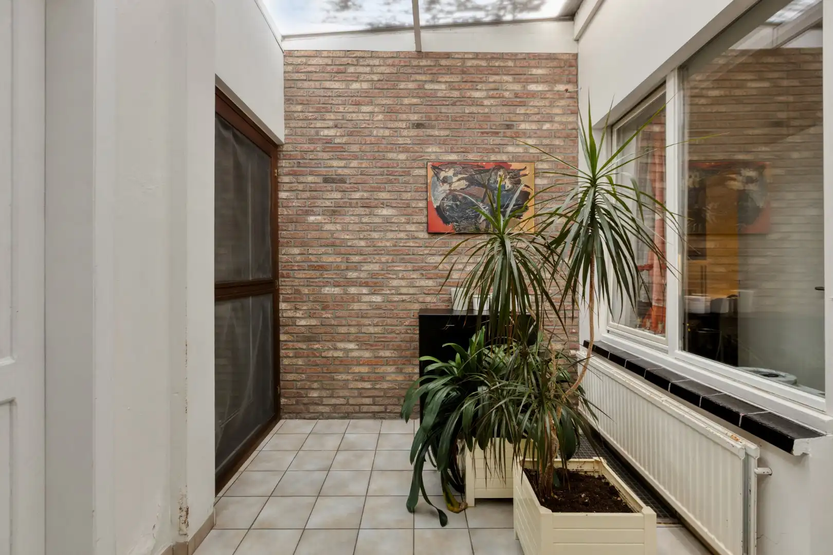 Ruim ingedeelde woning met oa 3 slpks op een gunstige locatie in het centrum foto 13