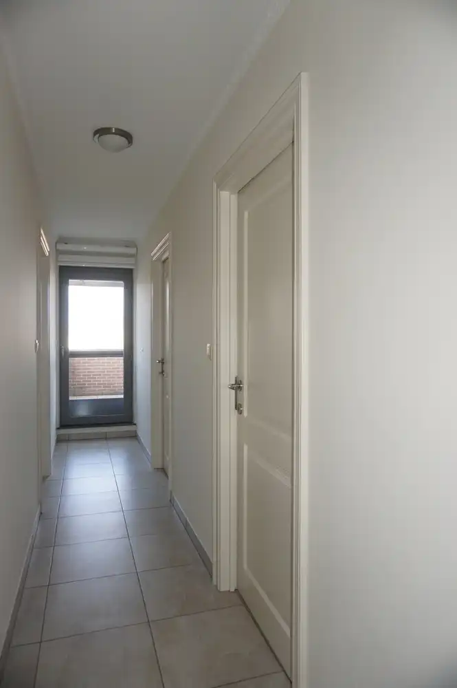 Ruim appartement van 110 m² met 2 slaapkamers, lift, 2 autostaanplaatsen en twee terrassen in het centrum van Paal foto 13
