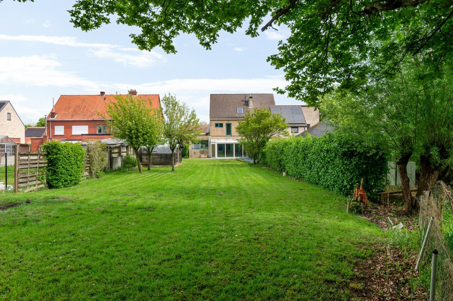 Ruime halfopen bebouwing met zuidwest georiënteerde tuin te Lint foto 27