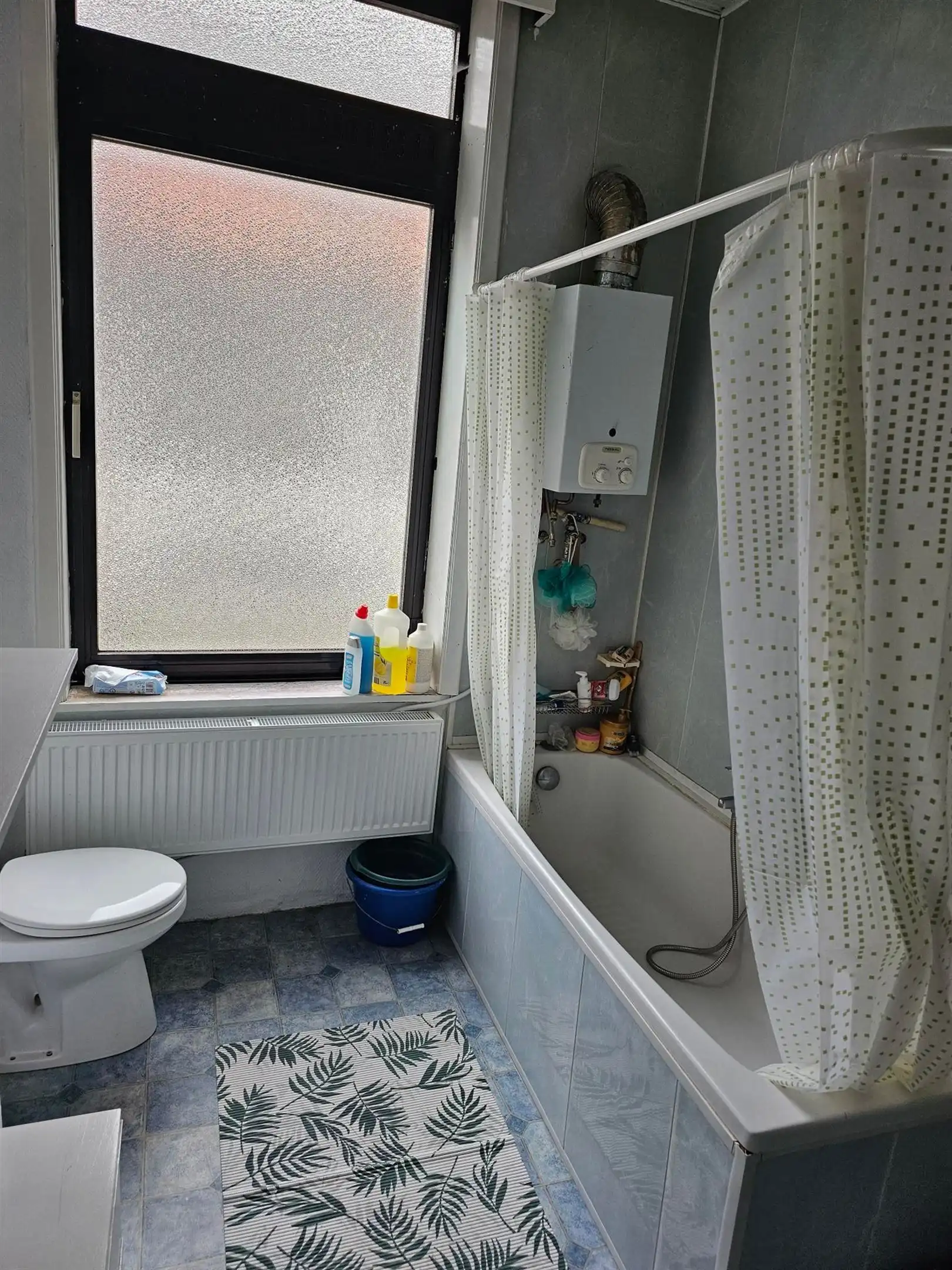 Gerenoveerde rijwoning met 3 slaapkamers gelegen vlakbij het bruisende stadscentrum van Gent. foto 9